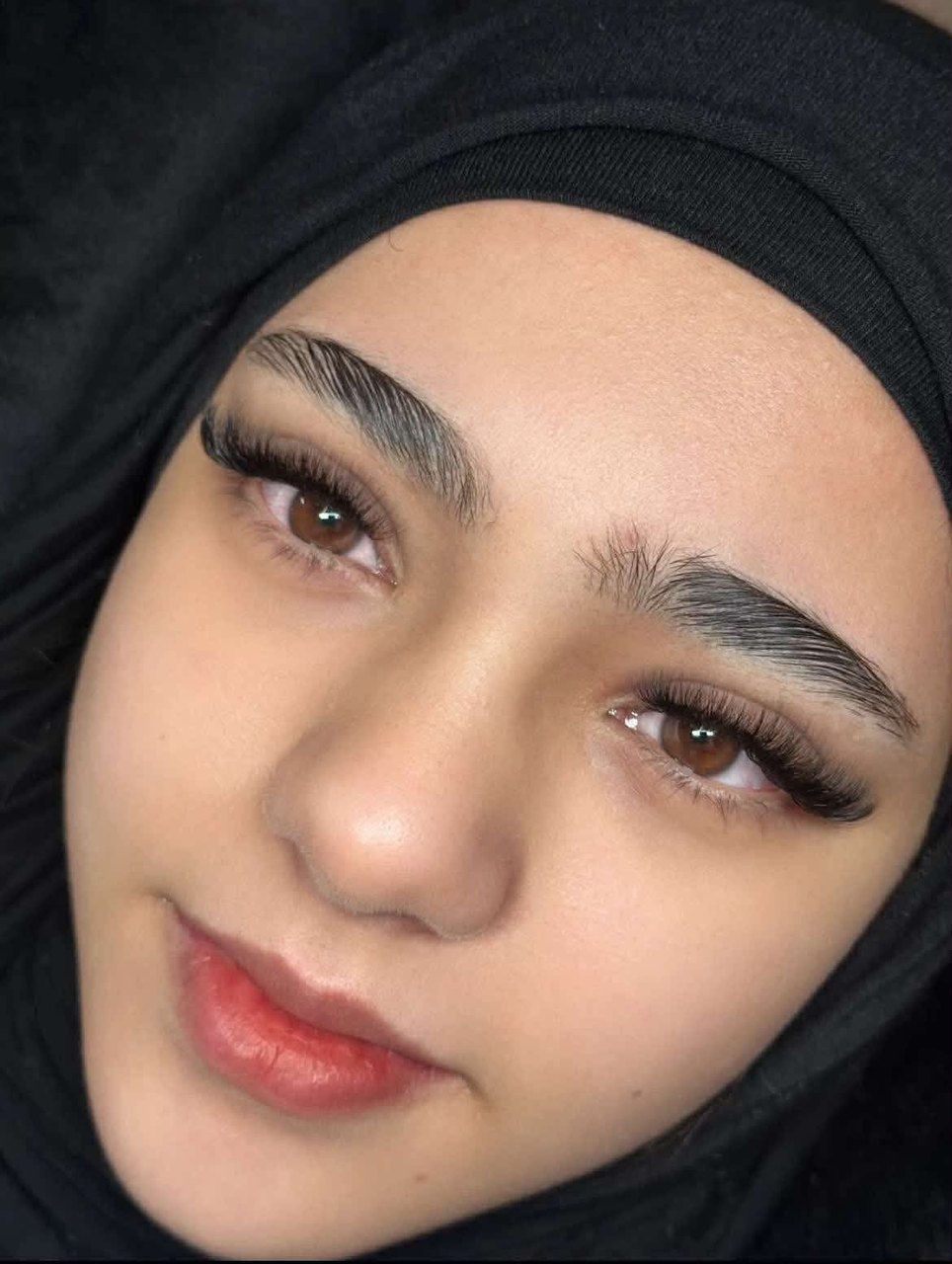 Eyelash extensions & groomed brows